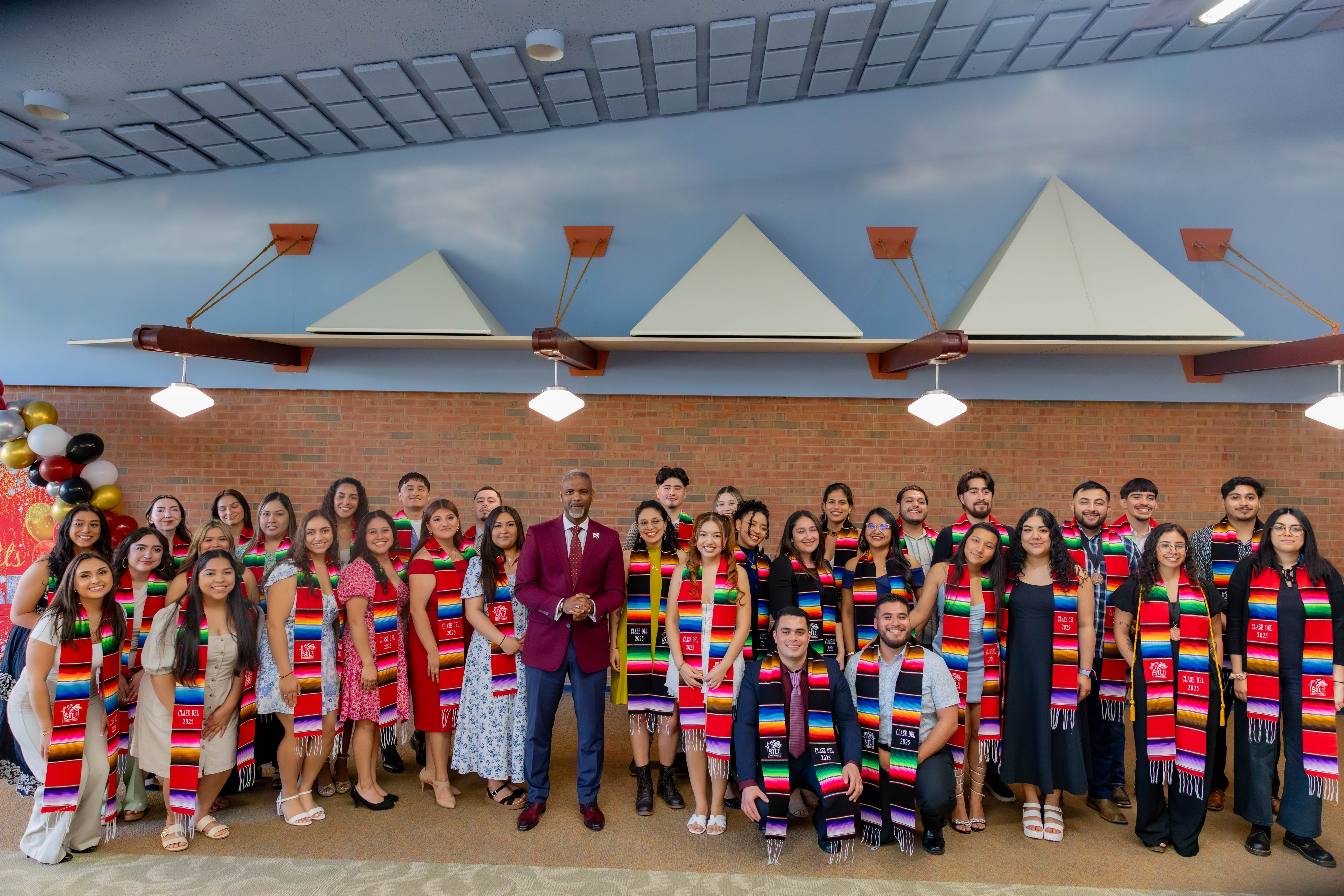 Hispanic/Latinx graduates group photo